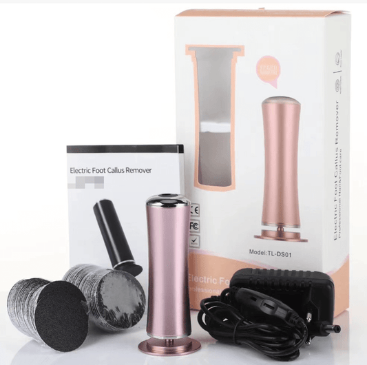 Electric foot file and callus remover retail box next to the rose gold device, charging cable, and replacement grinding discs