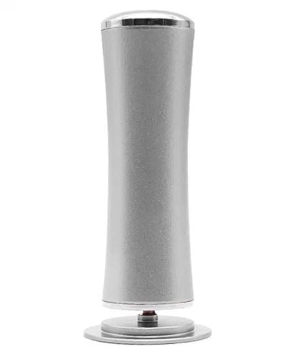 Grey electric foot file standing upright, front view