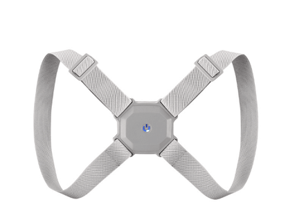 Grey figure-8 posture corrector strap laid flat, showing adjustable straps and central sensor