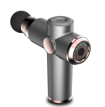 Grey massage gun with attachment head, standing upright